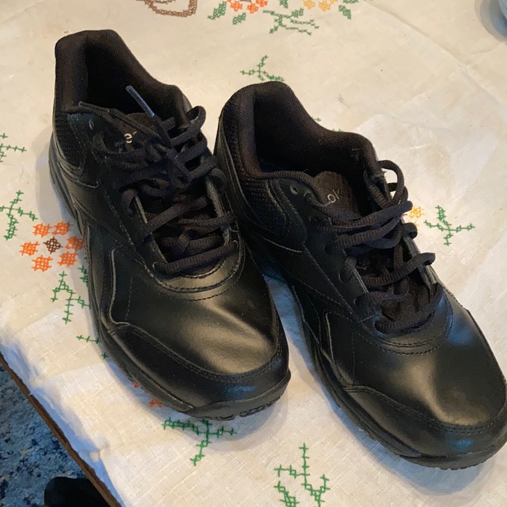 Women’s Reebok black sneakers. Memory foam inserts. In EUC.  Worn inside only.